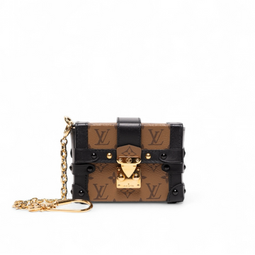 Authentic, Pre-owned Louis Vuitton Monogram Reverse Essential Trunk Clutch Bag/ Bag Charm