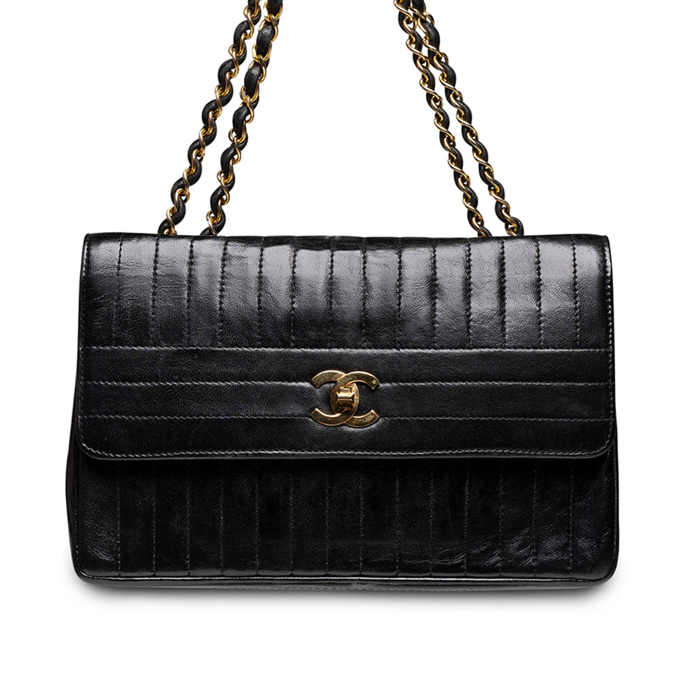 Bolso Chanel 2.55 Vintage, vertical, acolchado, de piel de cordero con solapa
