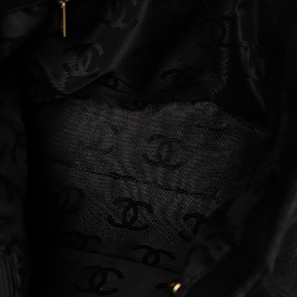 Bolso tote Chanel de piel y cadena de madera con asa