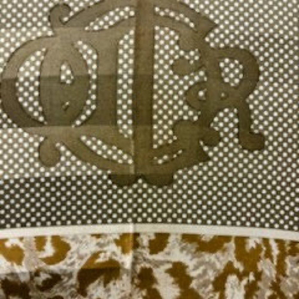 Paraguas con monograma y estampado animal de Christian Dior