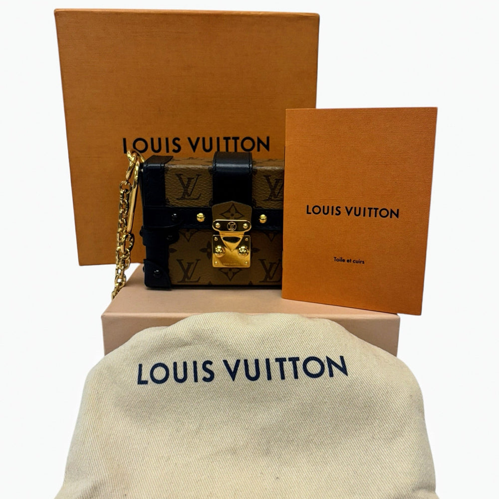 Louis Vuitton Monogram Reverse Essential Trunk Bag Anhänger/Armband