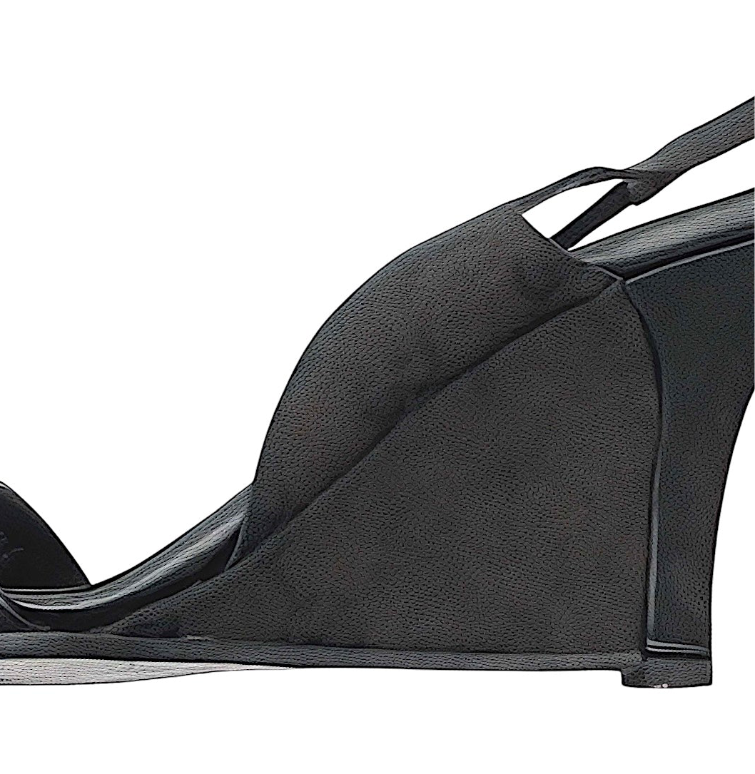 Side view of vintage Gucci black monogrammed wedge-heeled sandals on a white background