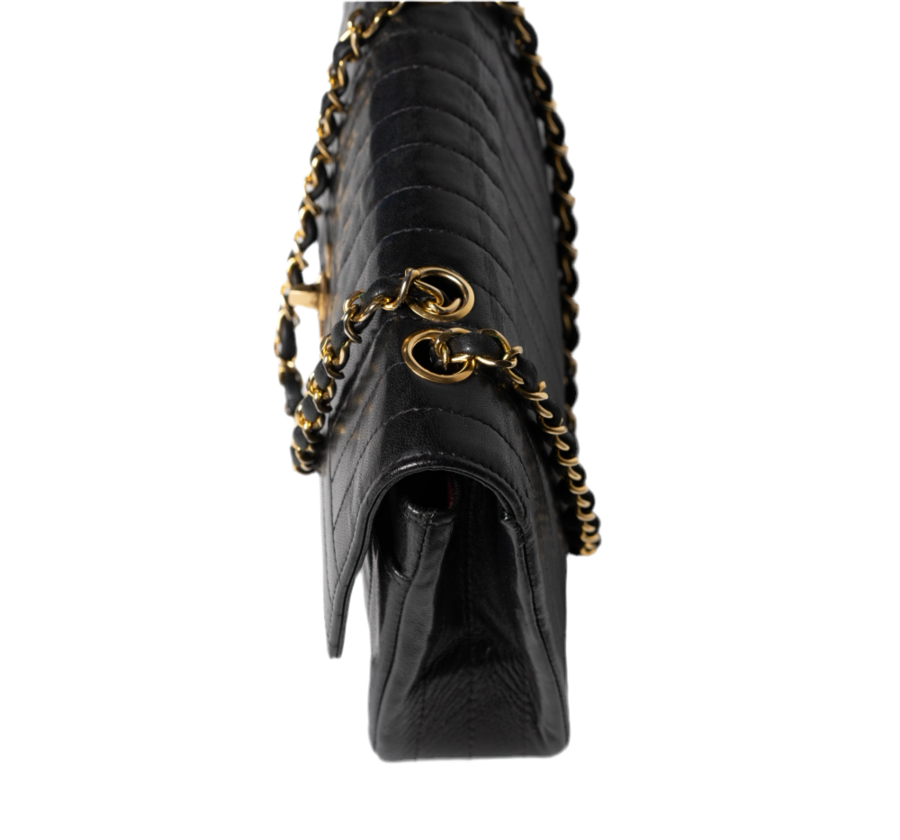 Bolso Chanel 2.55 Vintage, vertical, acolchado, de piel de cordero con solapa