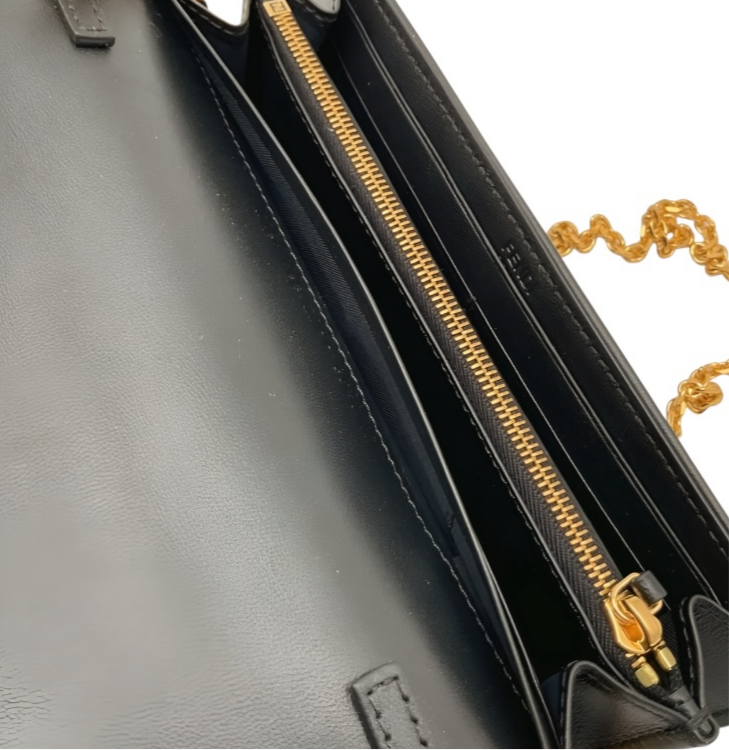 Cartera Fendi Baguette Continental con cadena, negra
