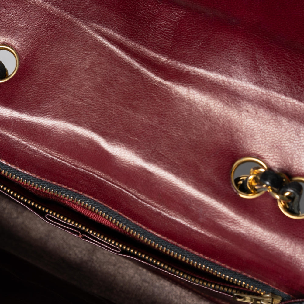 Bolso Chanel 2.55 Vintage, vertical, acolchado, de piel de cordero con solapa