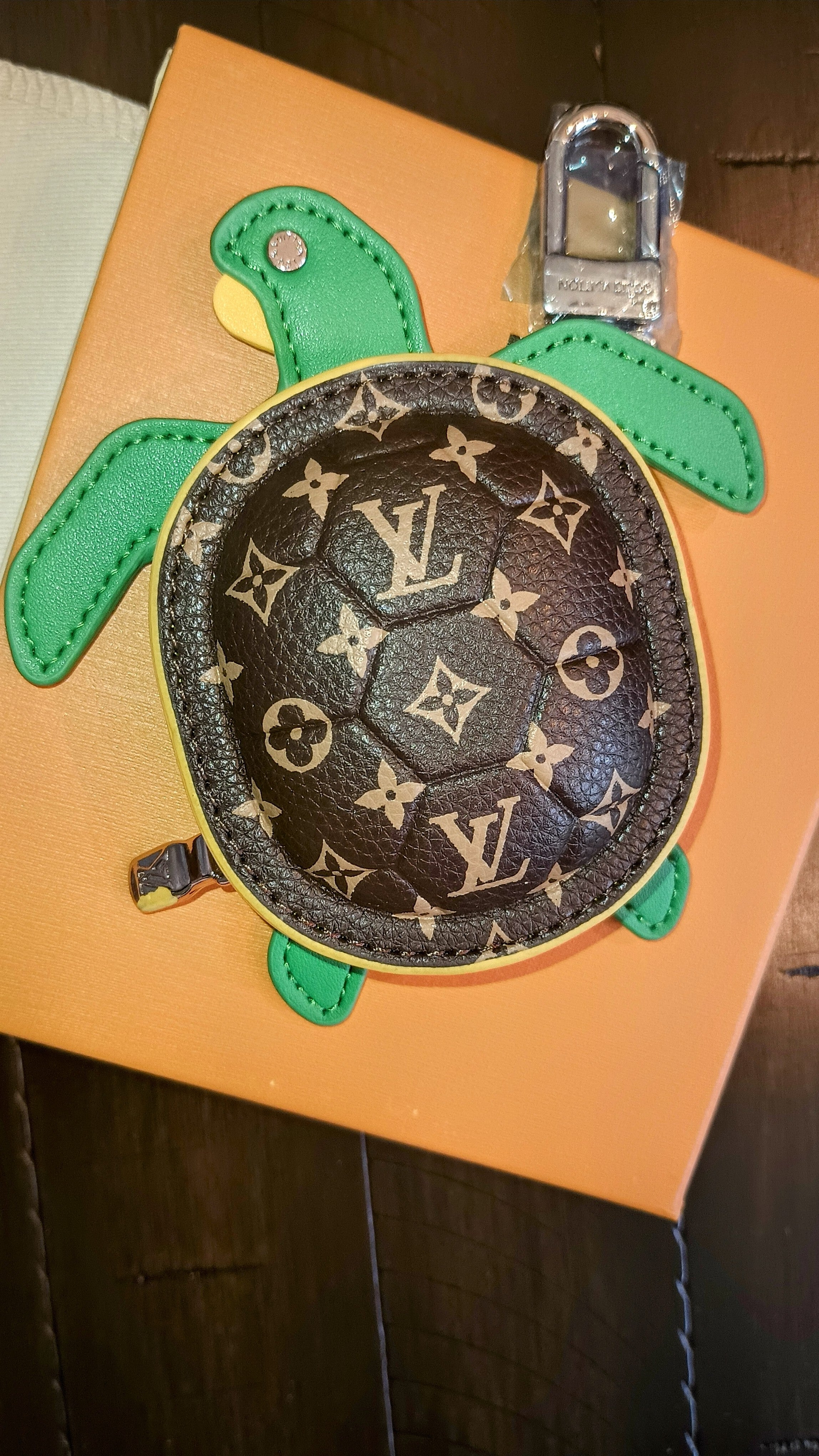 Louis Vuitton turtle bag charm, change  pouch