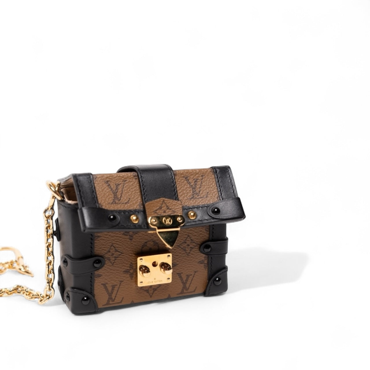 Louis Vuitton Monogram Reverse Essential Trunk Bag Anhänger/Armband