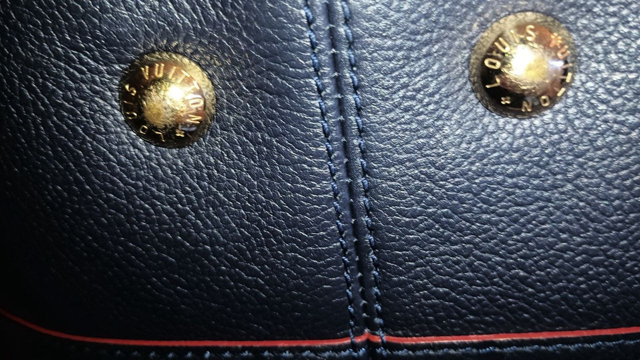 Louis Vuitton Melie Monogram Empreinte Bag, Navy