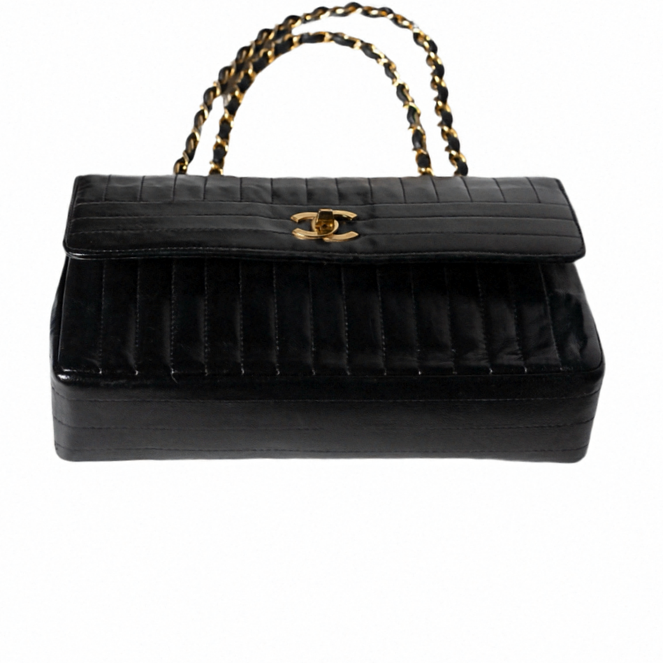Bolso Chanel 2.55 Vintage, vertical, acolchado, de piel de cordero con solapa