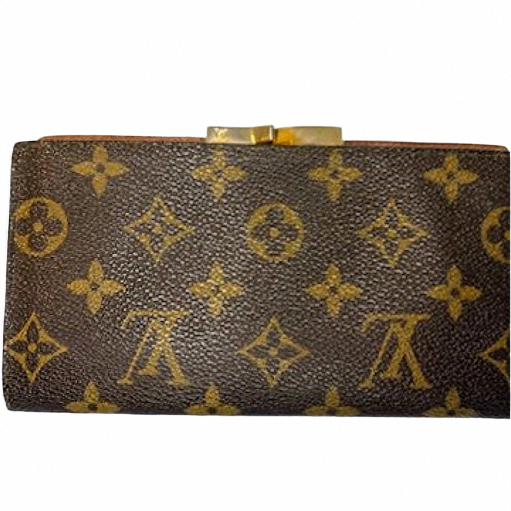 Cartera larga plegable con monograma y cierre de beso de Louis Vuitton